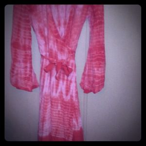 Tie dye wrap dress with long bell sleeves.